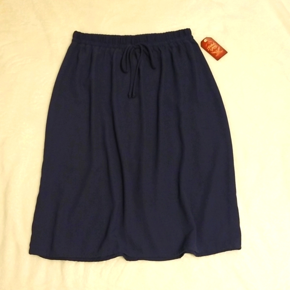 Faded glory woven midi skirt with an elastic waistband